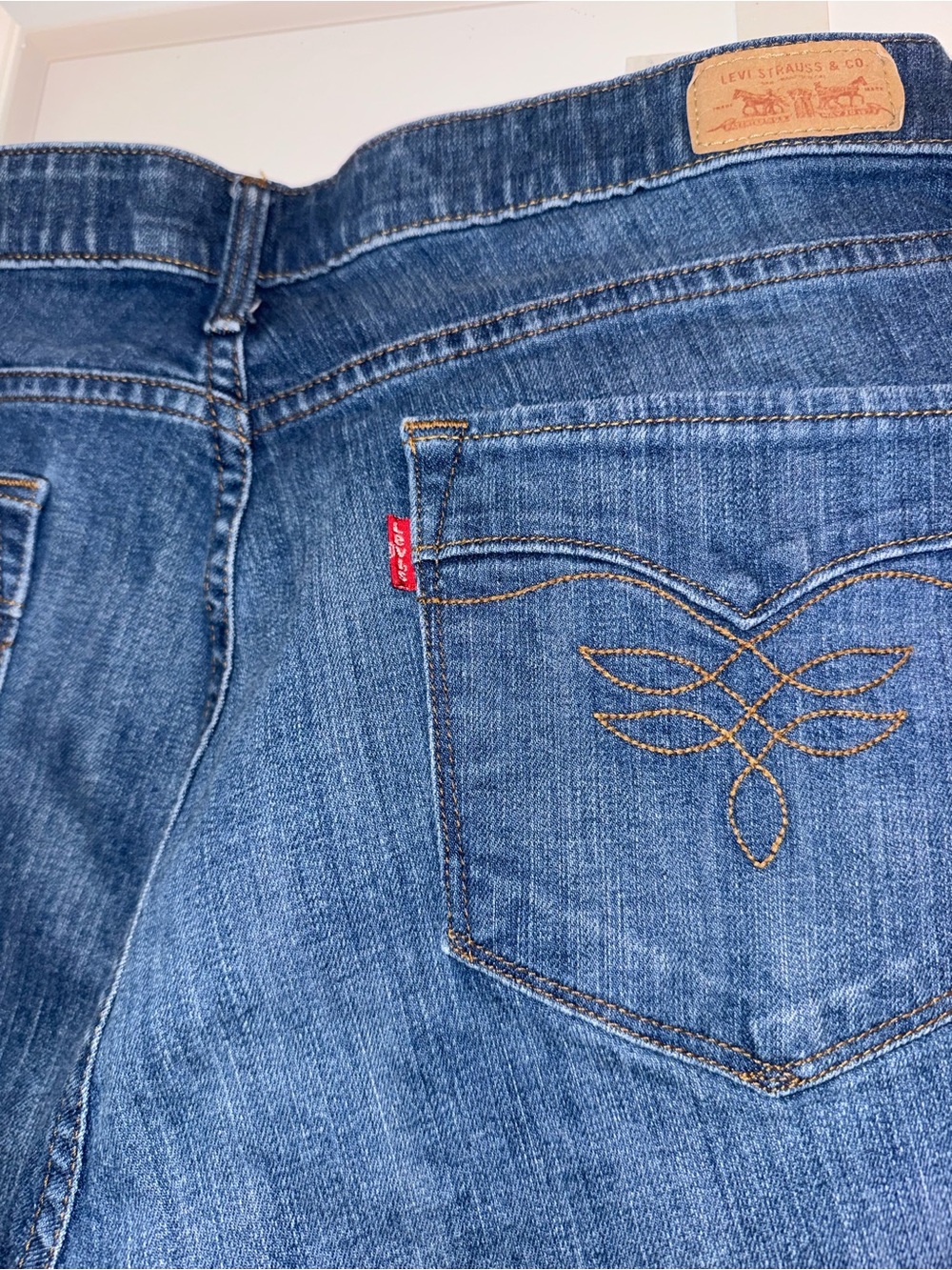 Levi’s Women’s Straight Leg Jeans Medium Wash Blue Denim with Paisley Waistband